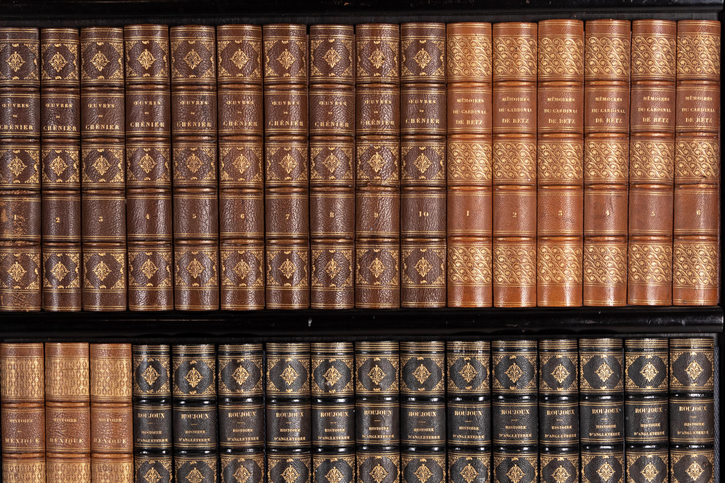 A Pair of Faux Book Wall Panels