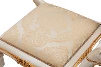 A Pair of Directoire Style White Painted and Parcel Gilt Benches
