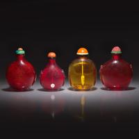 Four Chinese Ruby and Amber Glass Snuff Bottles — 寶石紅及琥珀料鼻烟壺四支