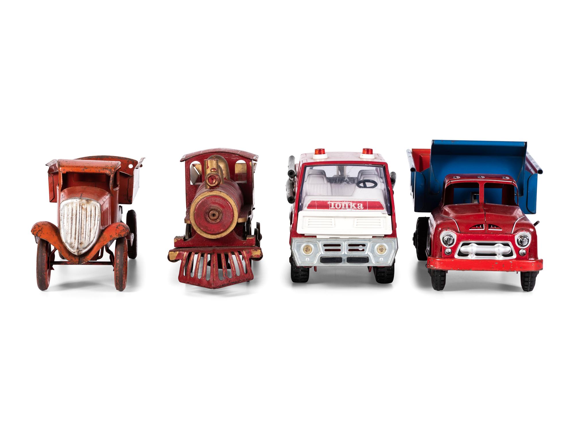 Three Pressed Steel and Tin Truck Toys