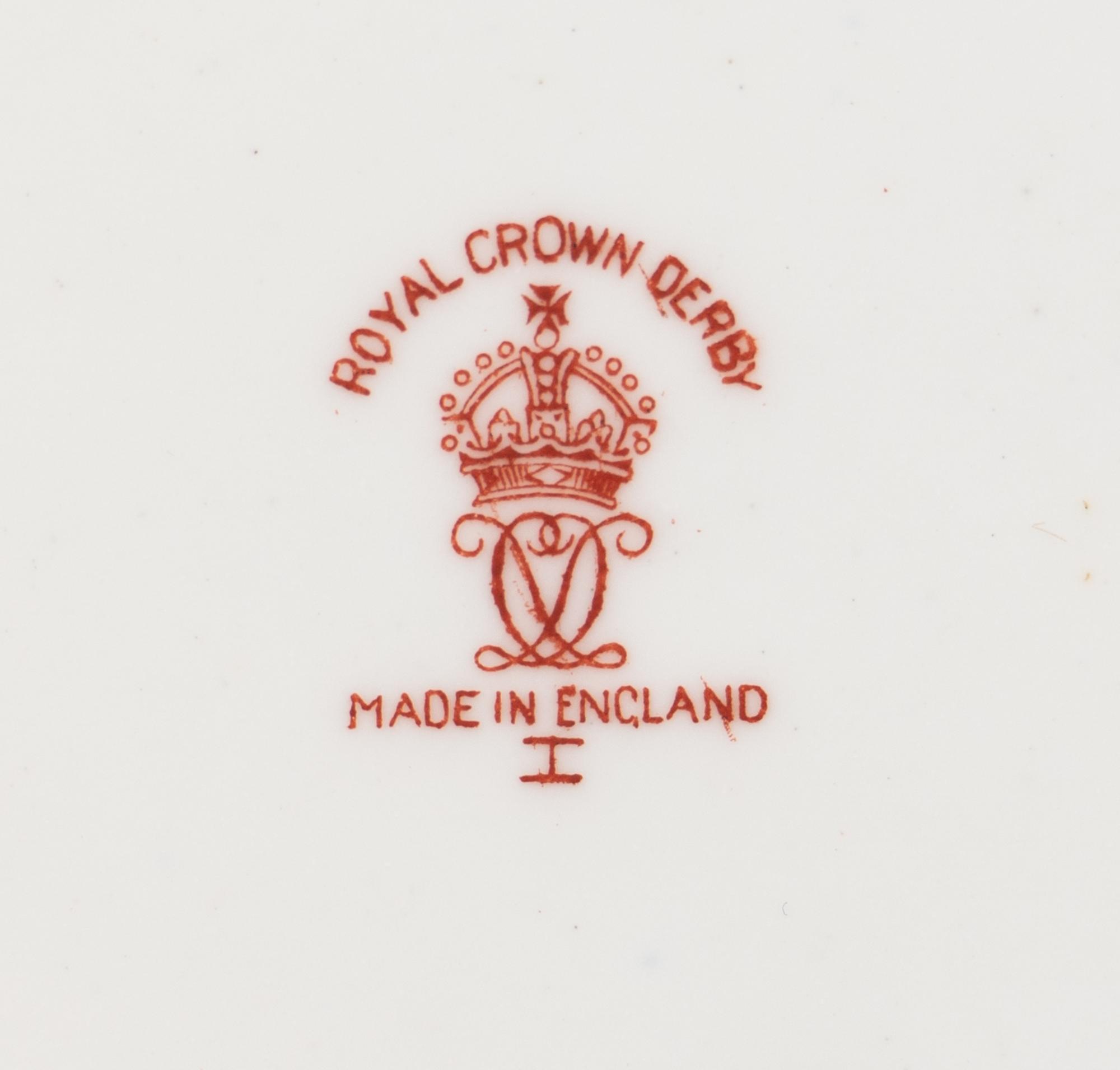 A Royal Crown Derby Old Imari Porcelain Dinner Service