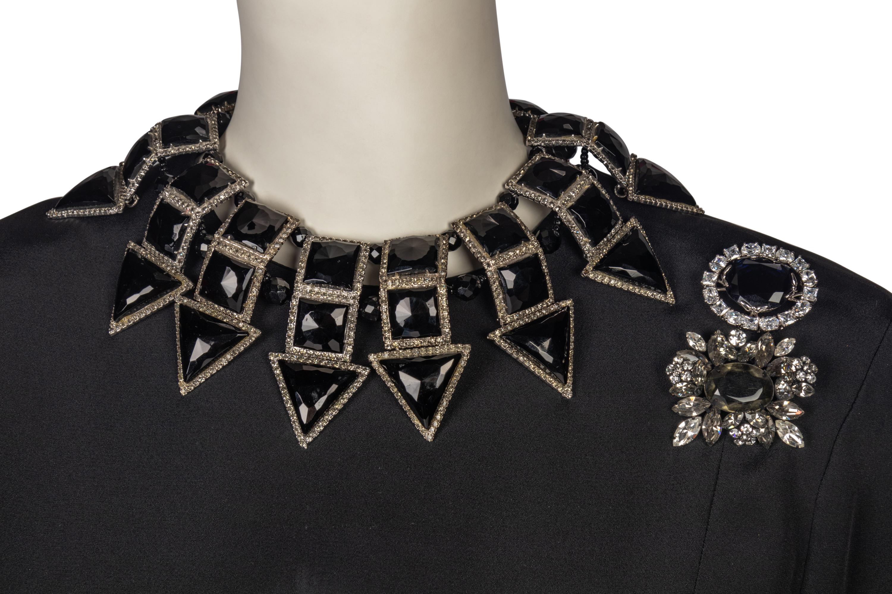 Two Designer Dresses with Two Brooches and Two Necklaces