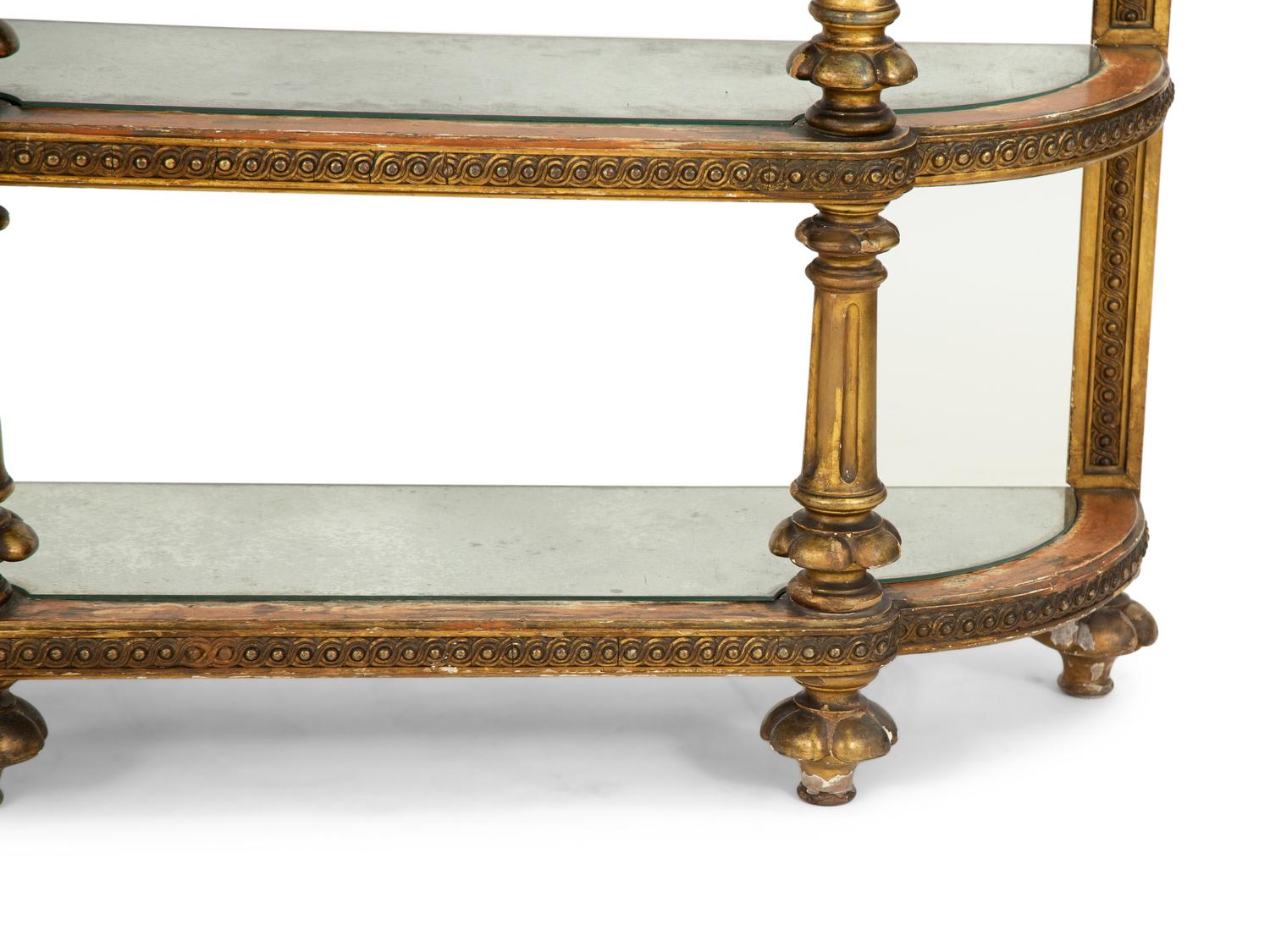 An Italian Carved and Painted Three Tier Etagere Console