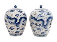 A Pair of Large Chinese Porcelain Blue and White Dragon Lidded Urns