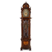 An English Carved Walnut Tall Case Clock