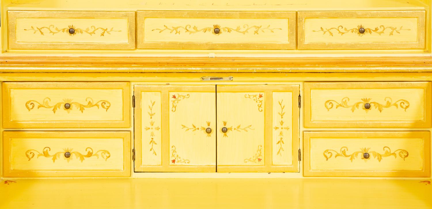 A Venetian Style Painted and Parcel Gilt Bureau Cabinet