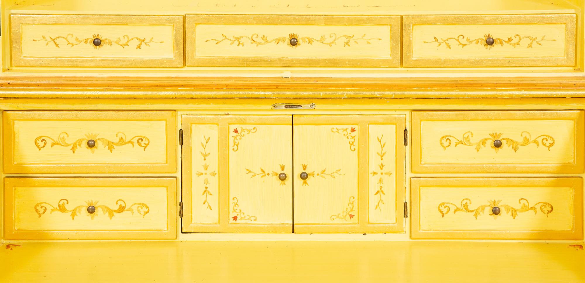 A Venetian Style Painted and Parcel Gilt Bureau Cabinet