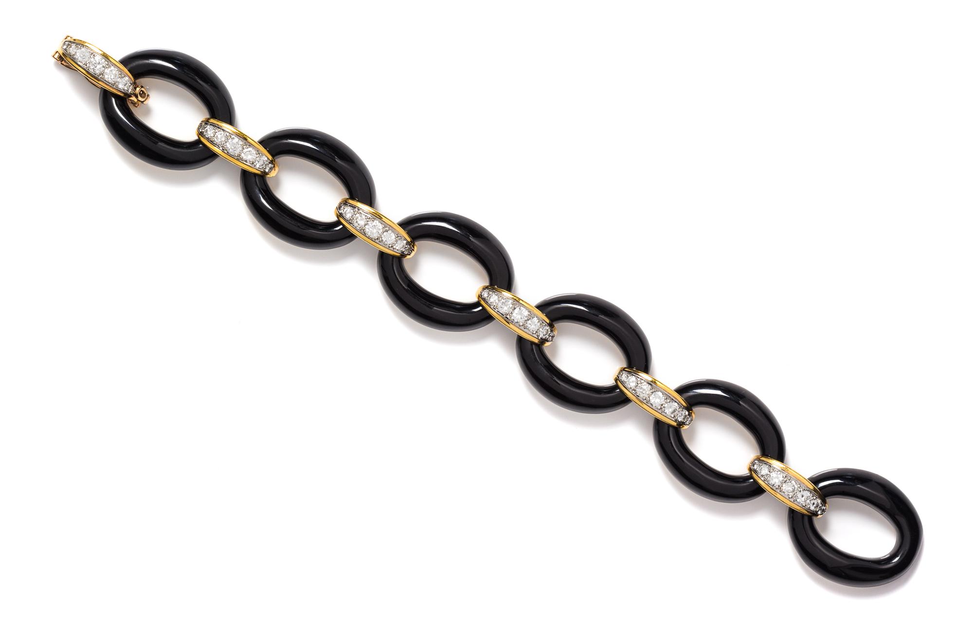 An 18 Karat Yellow Gold, Platinum, Diamond and Onyx Link Bracelet, Van Cleef & Arpels, 30.70 dwts.