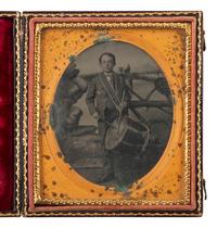 [EARLY PHOTOGRAPHY]. 2 sixth plate tintypes of civilians, incl. young men in boots & drummer boy.