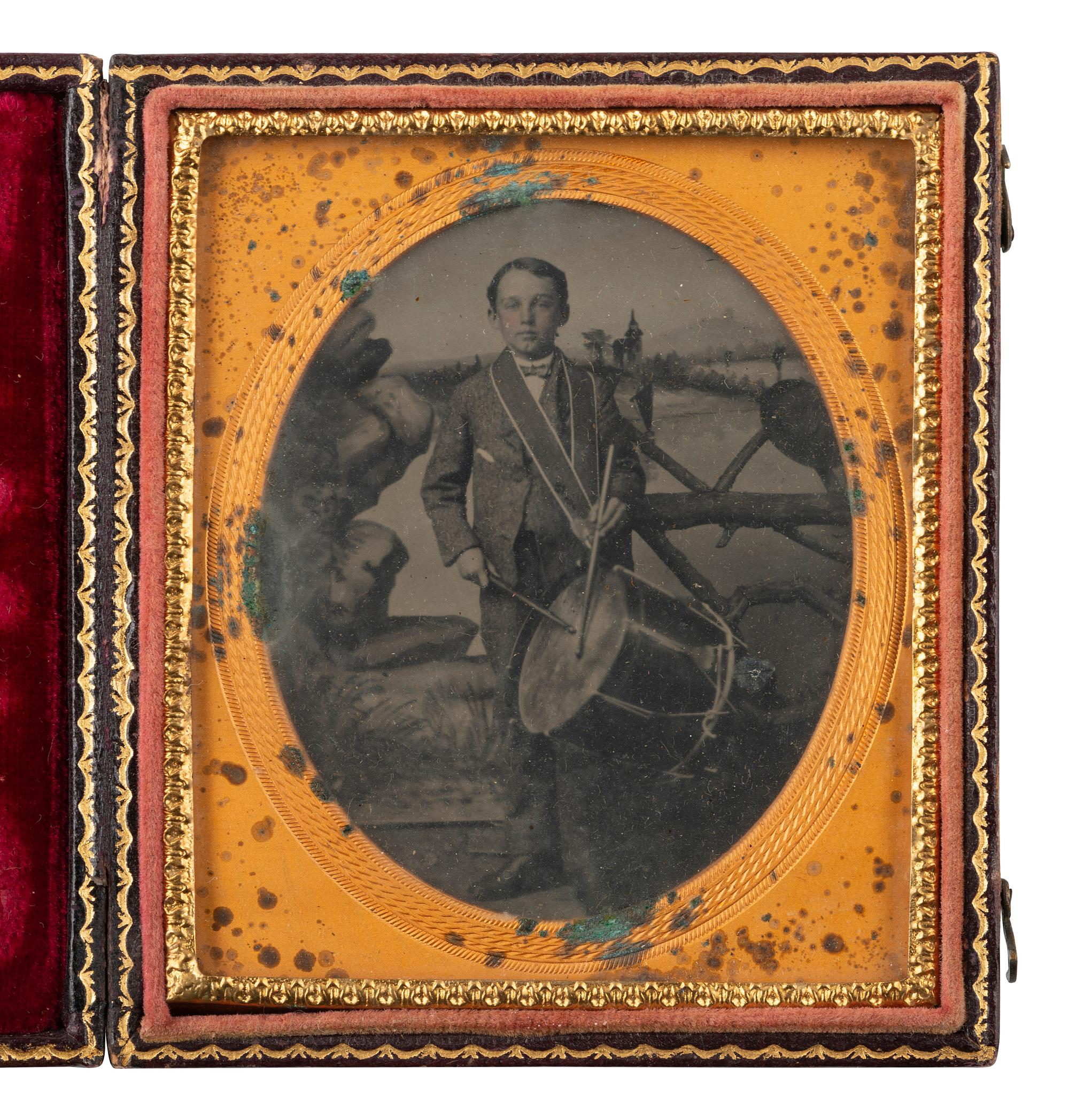 [EARLY PHOTOGRAPHY]. 2 sixth plate tintypes of civilians, incl. young men in boots & drummer boy.