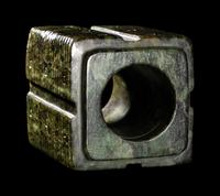 A Chinese Carved Green Jade Cong