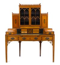 An Edwardian Satinwood and Marquetry Carlton Desk, Height overall 60 3/4 x width 49 x depth 24 inches.