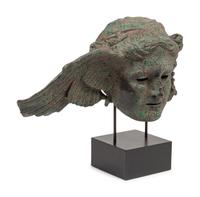 A Patinated Composition Head of Hypnos, After the Antique
