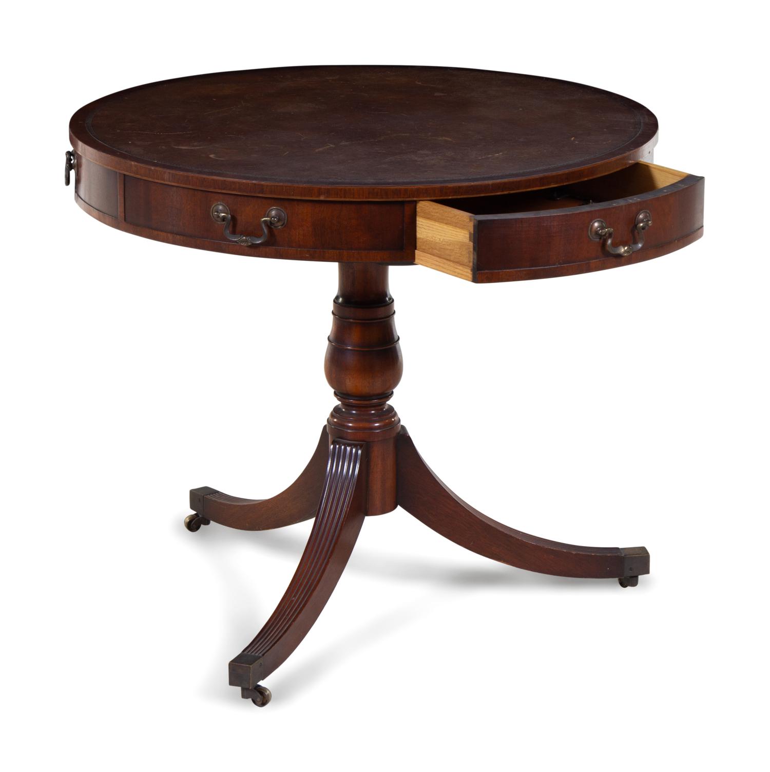 A George III Style Tooled Leather Inset Mahogany Drum Table