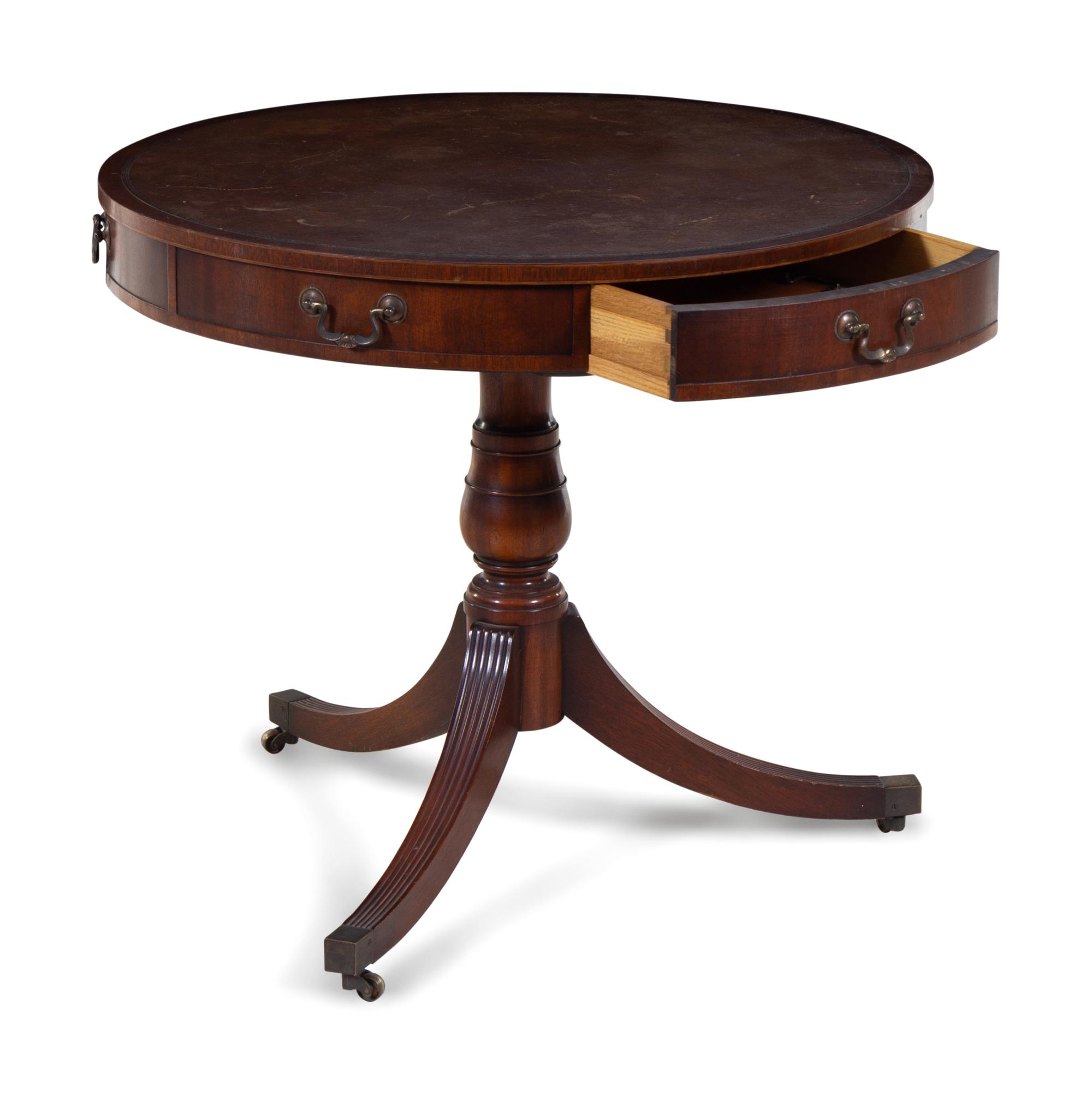 A George III Style Tooled Leather Inset Mahogany Drum Table