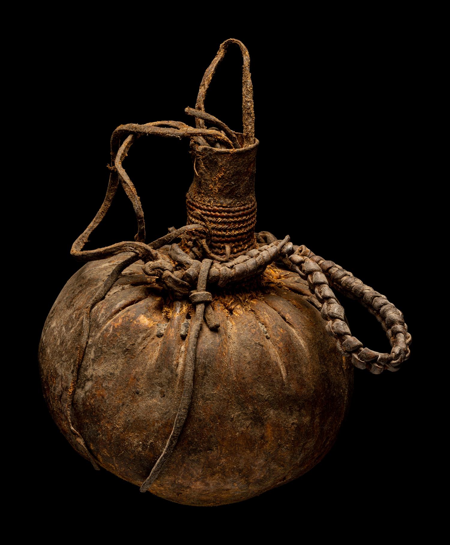 Eleven Oceanic and African Drums, Baskets, and Tools