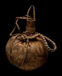 Eleven Oceanic and African Drums, Baskets, and Tools