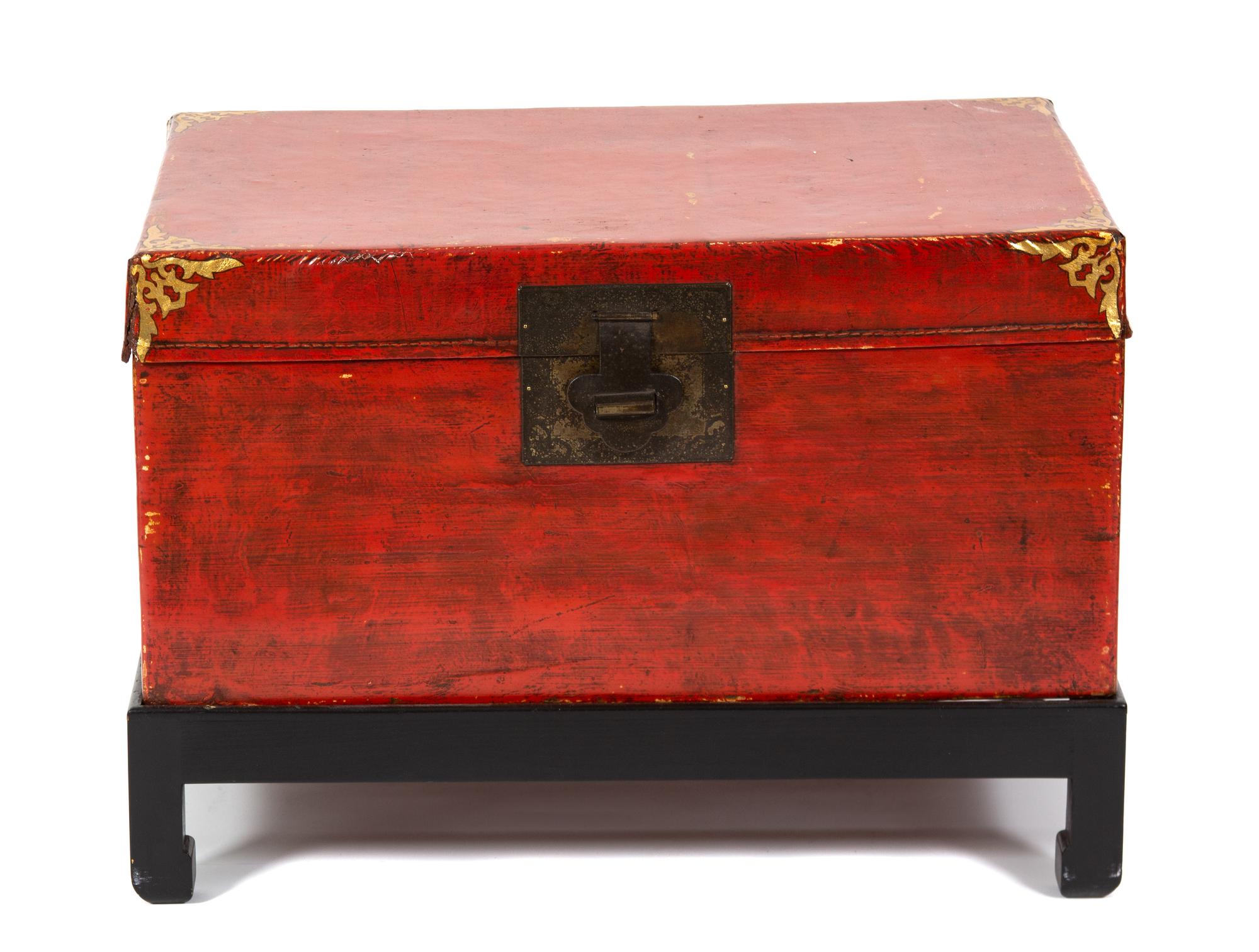 A Chinese Red Lacquer Chest Height 14 x width 29 x depth 20 1/2 inches. — 20TH CENTURY