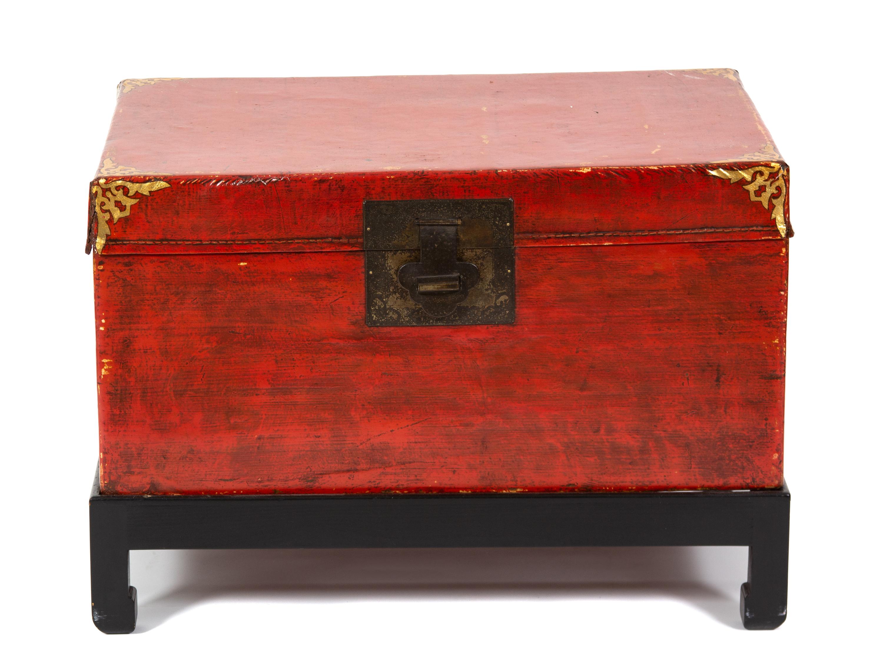 A Chinese Red Lacquer Chest Height 14 x width 29 x depth 20 1/2 inches. — 20TH CENTURY