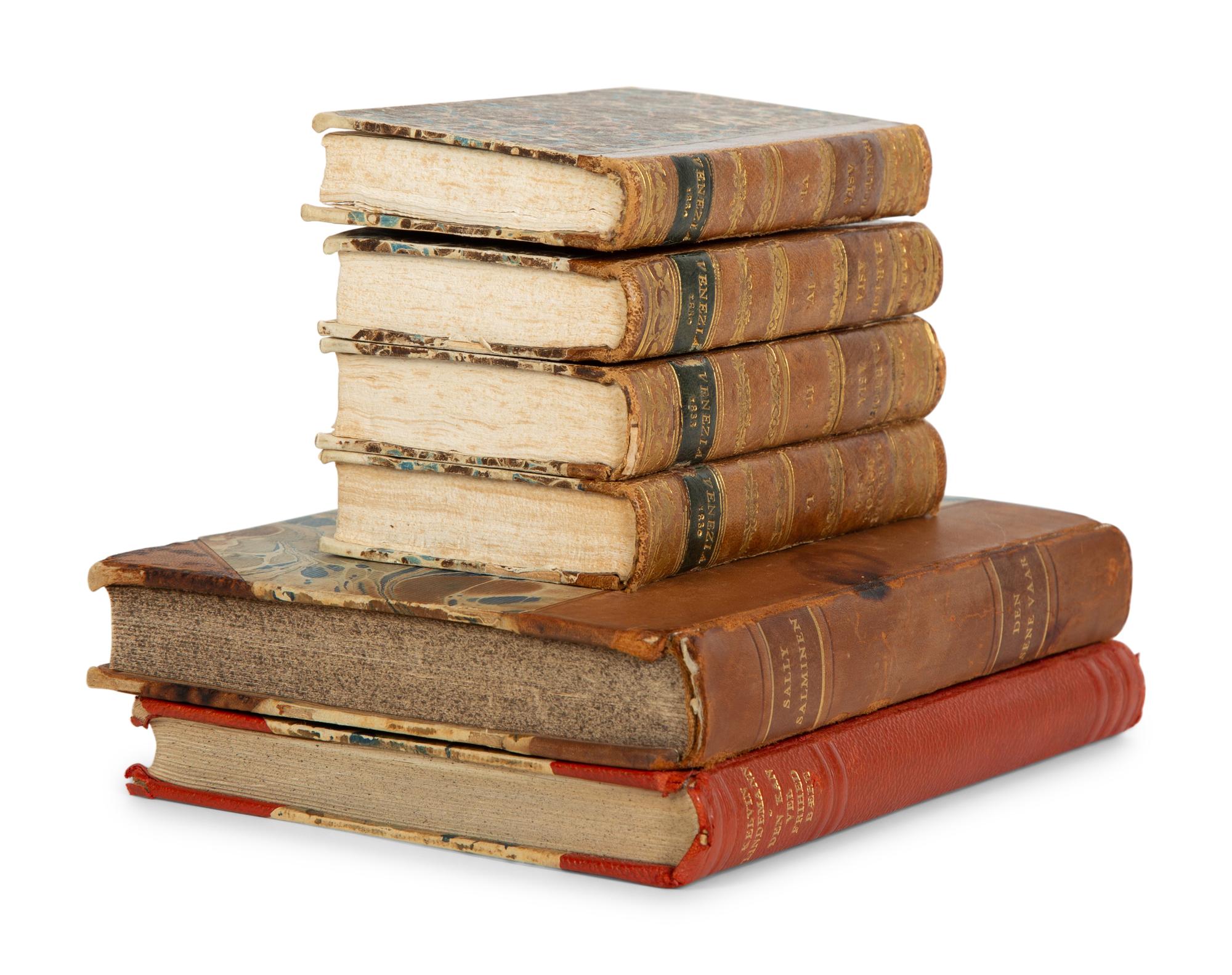 Six Gilt-Tooled Leather Books with Marbled Boards