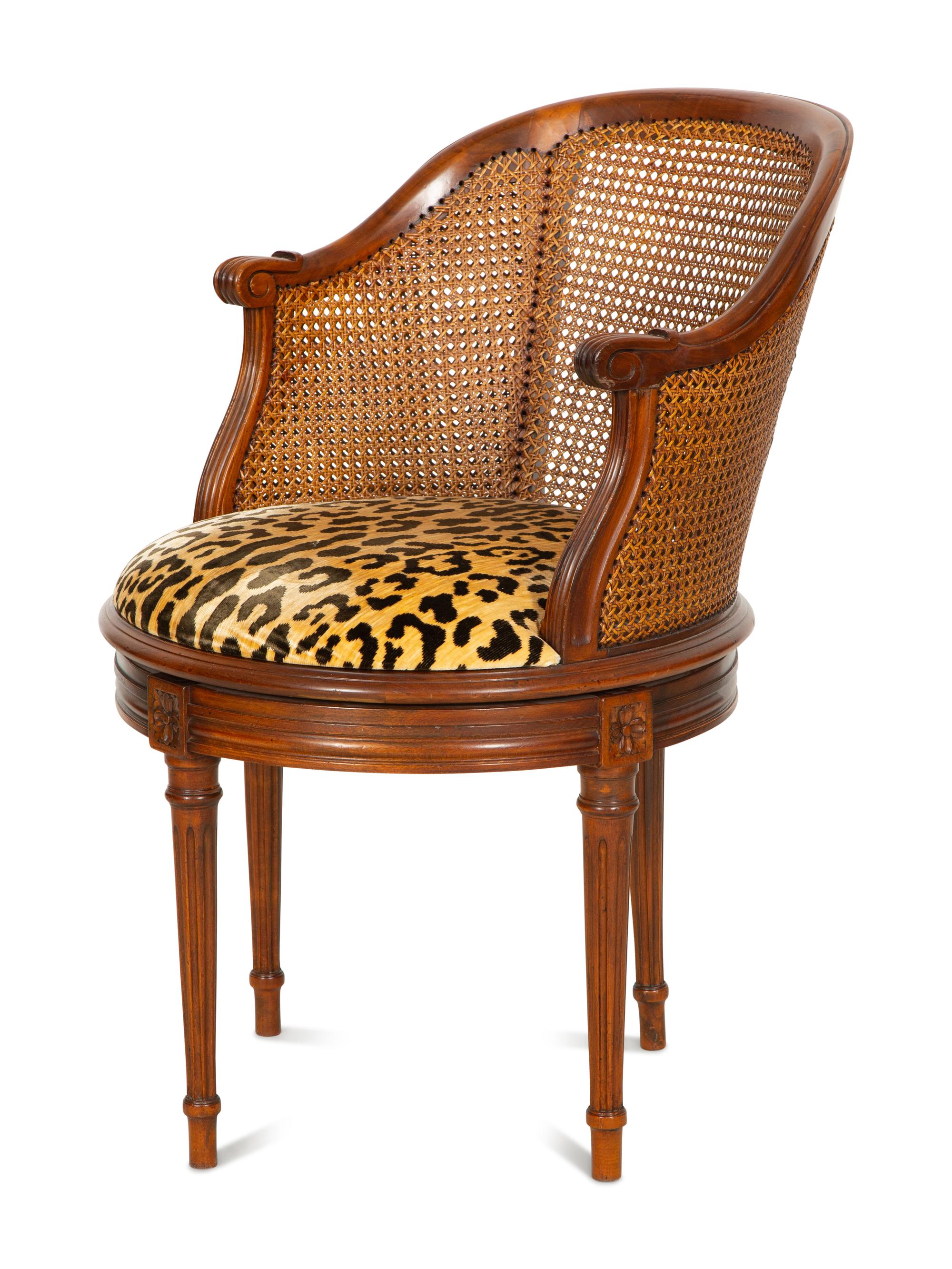 A Louis XVI Style Caned Bureau Chair