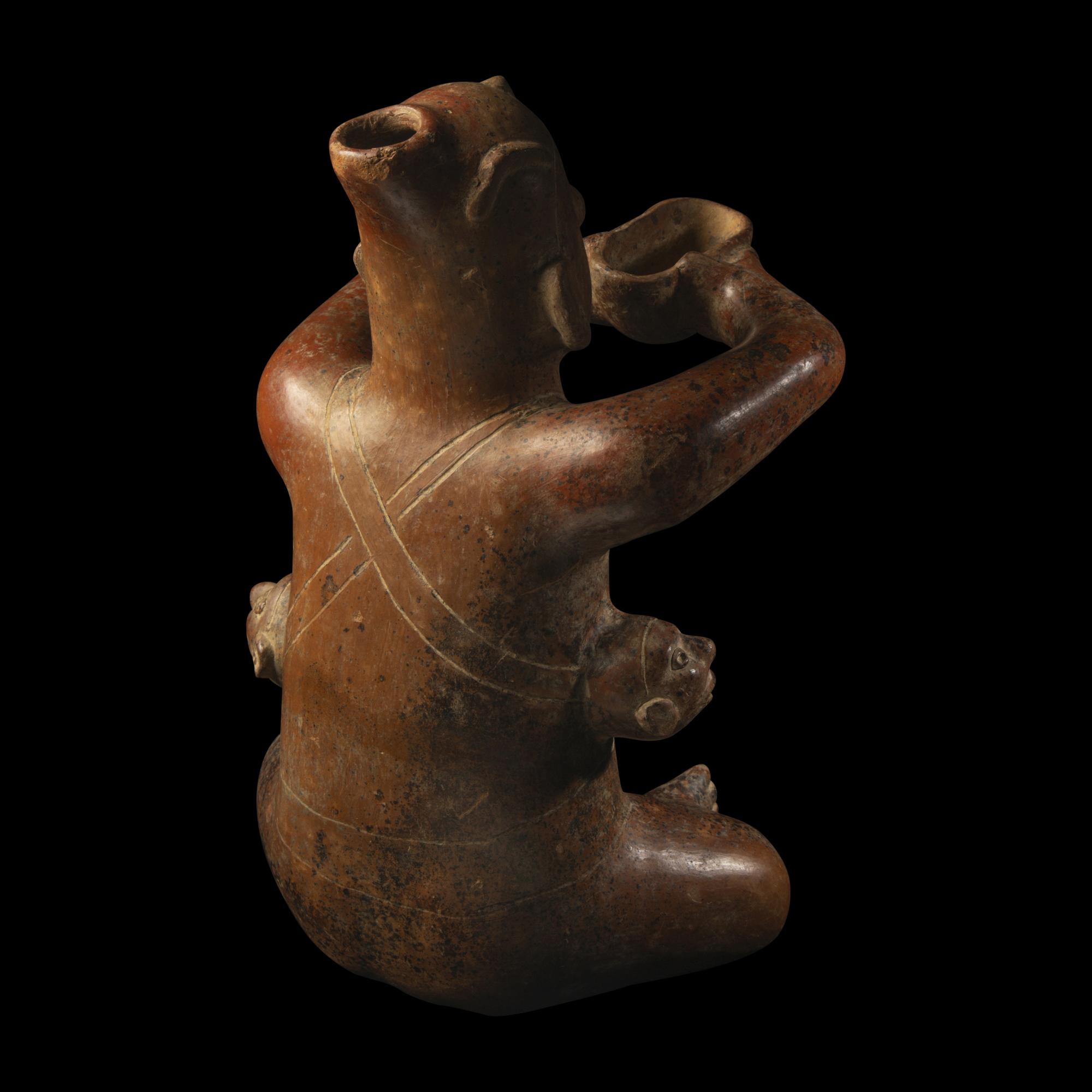 A Colima Terracotta Seated Figure