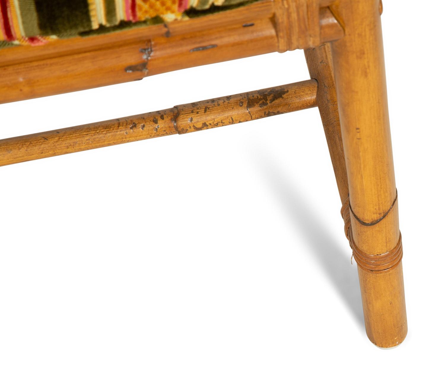 A Maguire Rattan Table and Four Chairs
