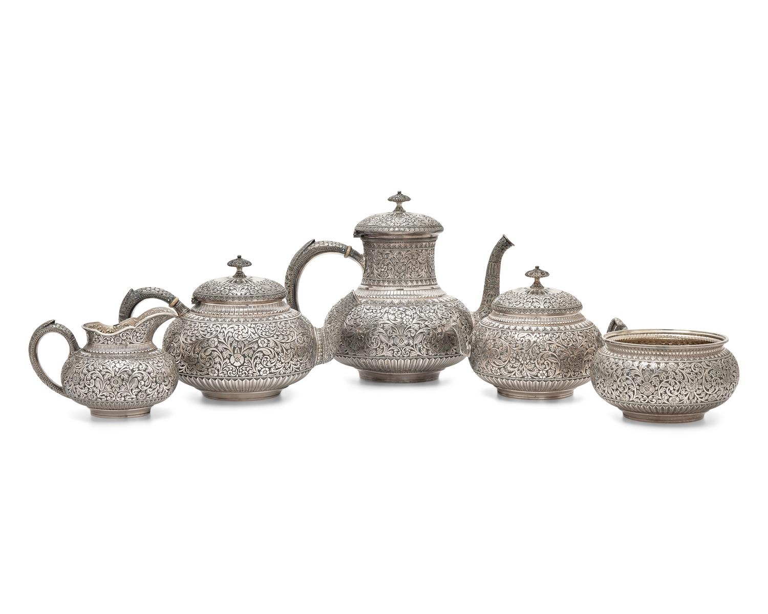 A Five-Piece Sterling Silver Coffee Service in the Persian Taste