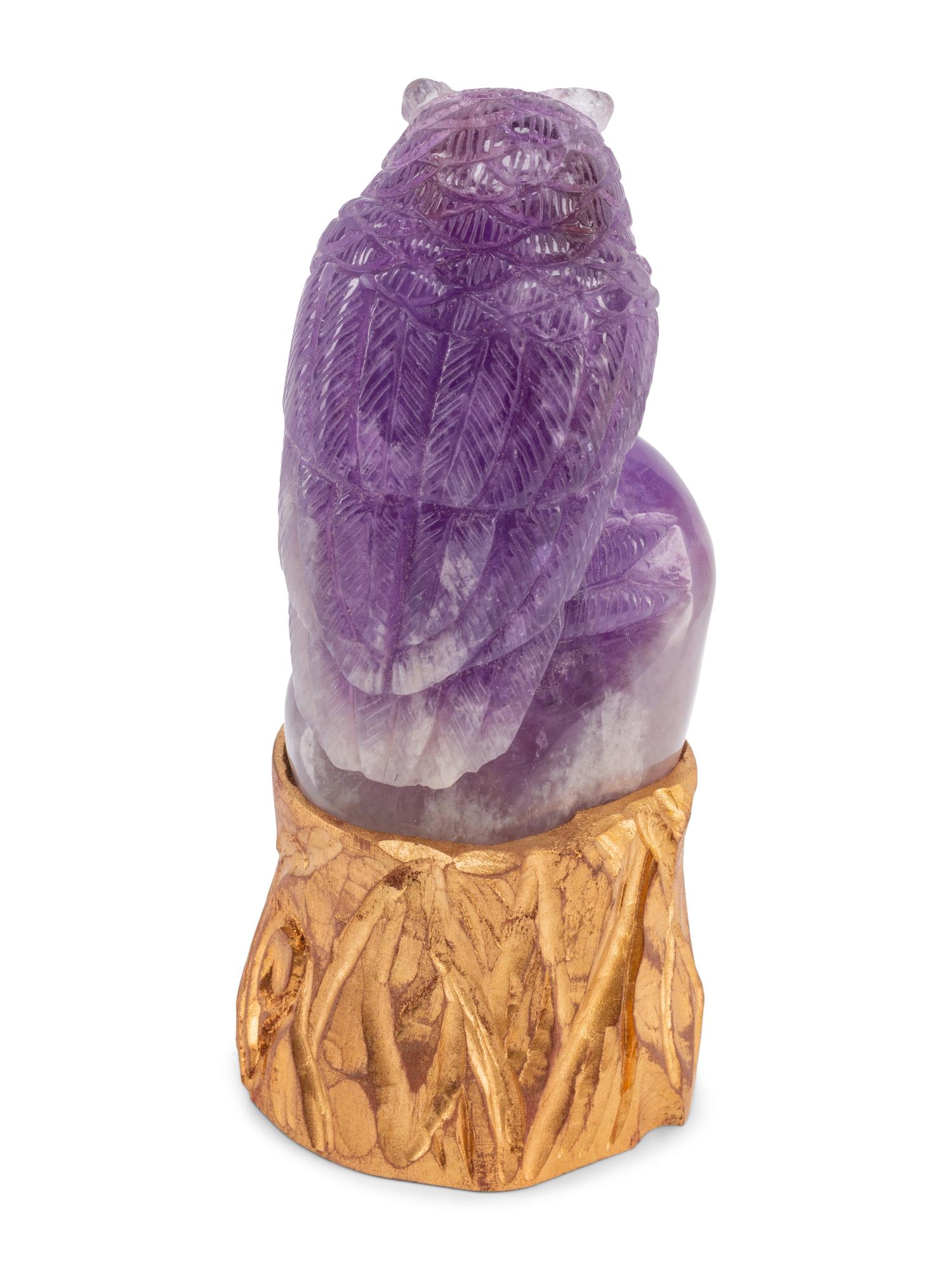 A Carved Amethyst Owl on a Carved Giltwood Base