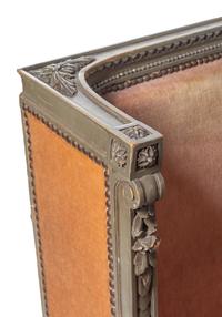 A Pair of Louis XVI Carved and Painted Walnut Bergères à L'Oreilles