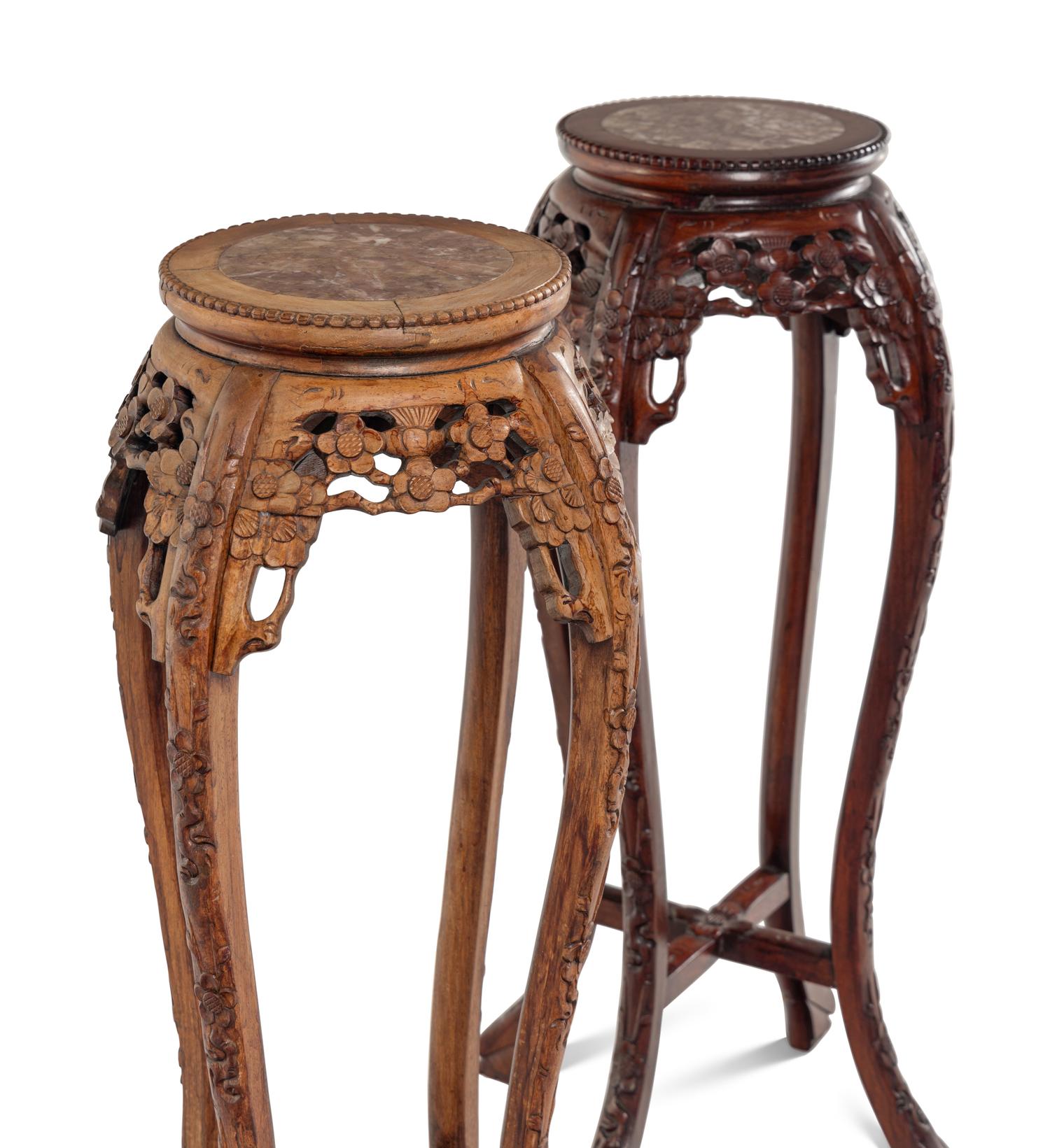 A Pair of Chinese Carved Hardwood Pedestals