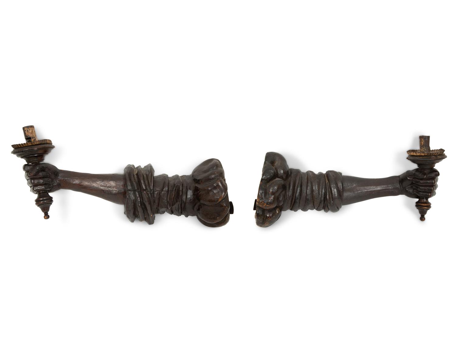 A Pair of Italian Carved, Painted and Parcel Gilt Arm-form Wall Sconces