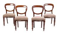 A Set of Four Victorian Walnut Side Chairs Height 34 1/2 inches.