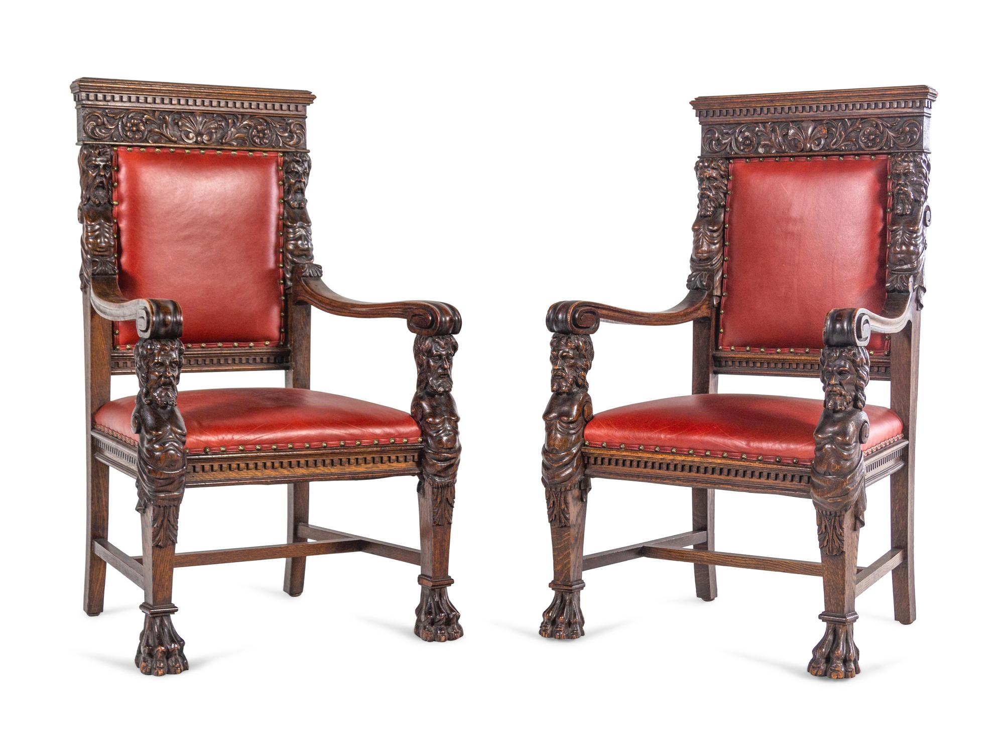A Set of Eight R.J. Horner Carved Oak Man of the Mountain Dining Chairs