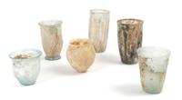 A Collection of Roman Glass Beakers and Cups, Height of tallest 5 inches.