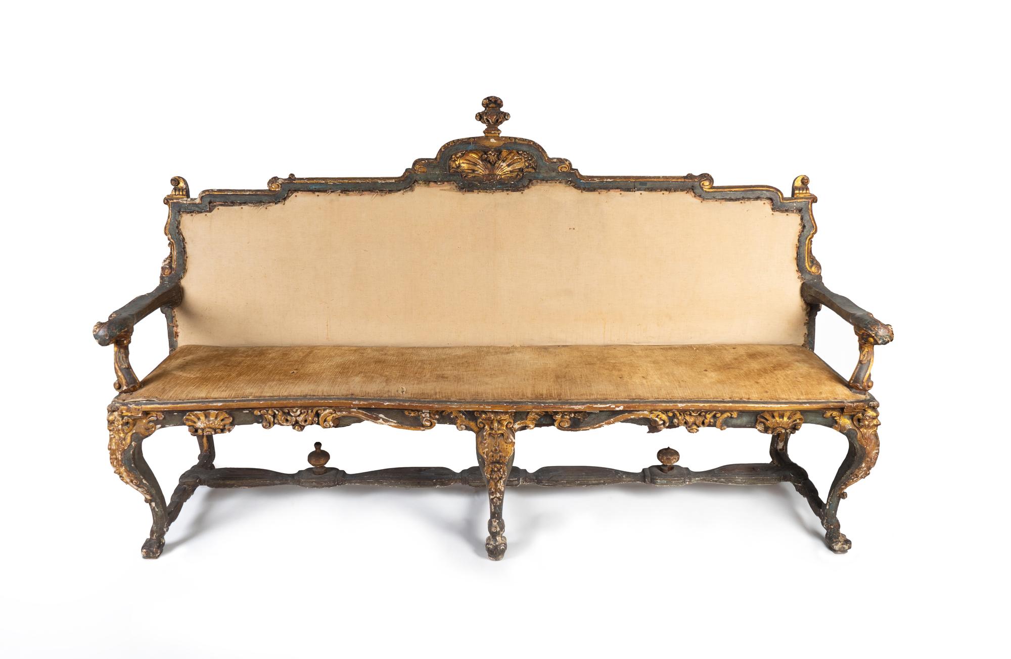 An Italian Early Rococo Parcel-Gilt and Painted Settee — POSSIBLY PORTUGUESE, SECOND QUARTER 18TH CENTURY