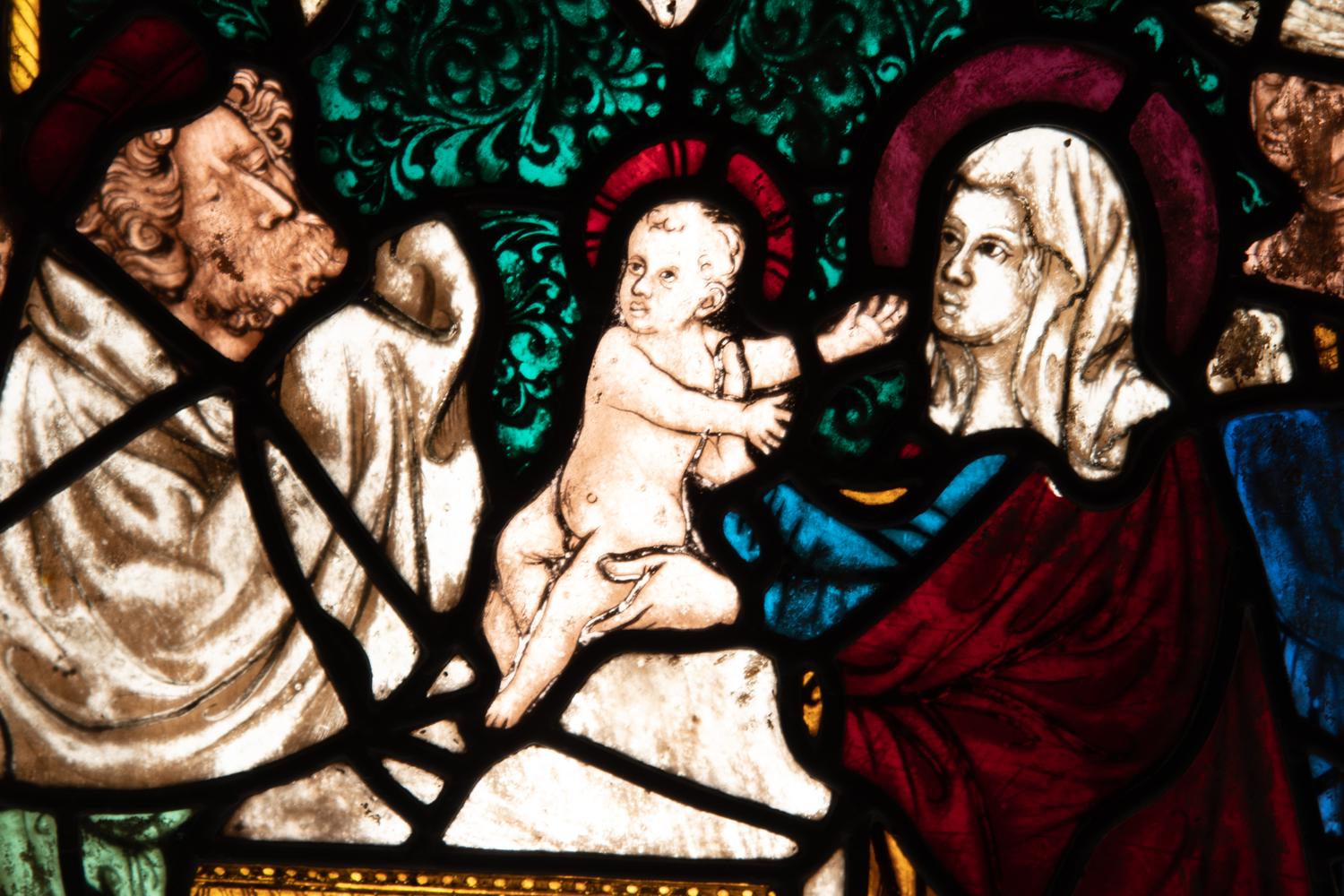 A Continental Leaded Glass Window Depicting the Holy Family