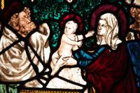 A Continental Leaded Glass Window Depicting the Holy Family