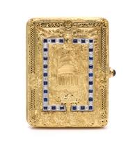 An 18 Karat Yellow Gold, Platinum, Ruby, Diamond and Sapphire Compact, 102.90 dwts.