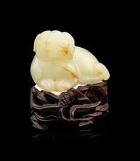 A Carved Russet and White Jade Figure of Mythical Beast, Tianlu