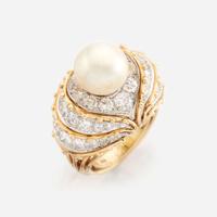 A cultured pearl, diamond, gold, and platinum ring