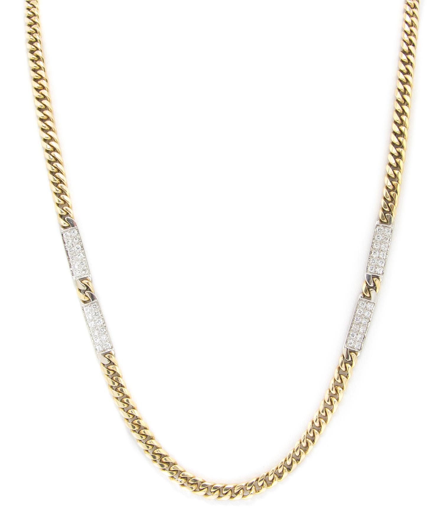 A 14 Karat Gold and Diamond Curb Link Chain Necklace, 40.20 dwts.