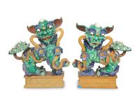 A Pair of Chinese Glazed Ceramic Foo Dogs