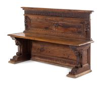 An Italian Renaissance Revival Carved Walnut Hall Bench