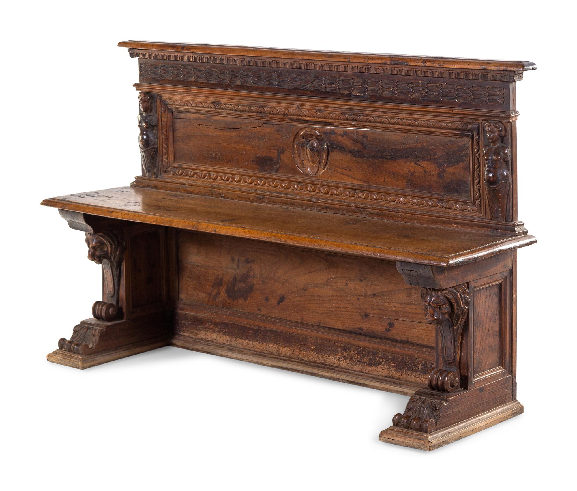 An Italian Renaissance Revival Carved Walnut Hall Bench