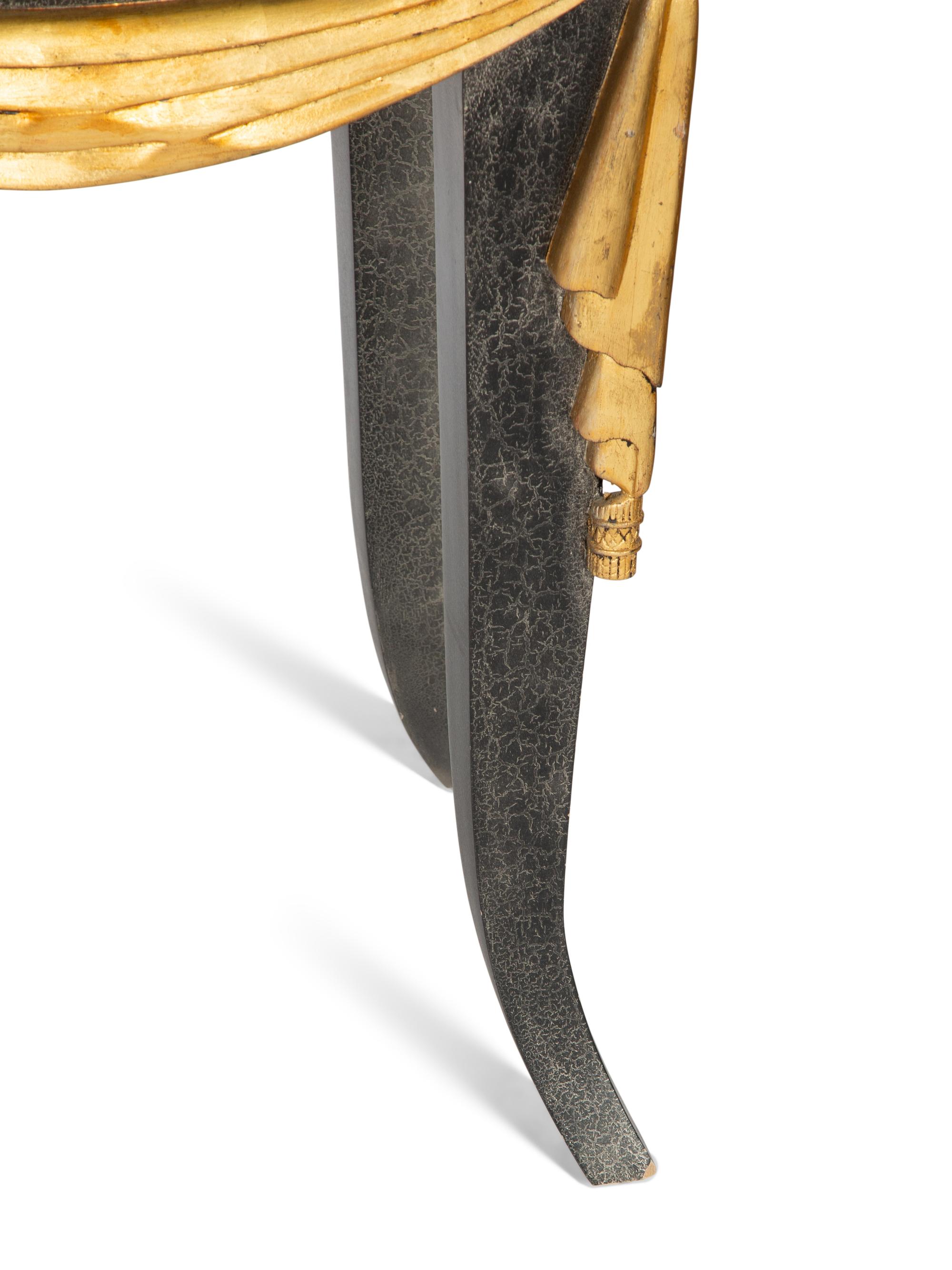 An Ebonized Console Table with Granite Top and Gilt Swag Motif