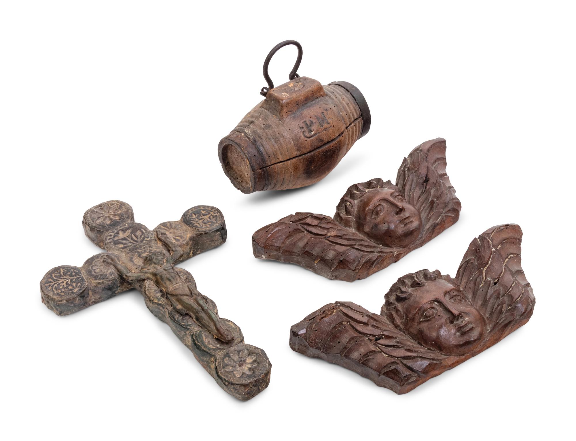 A Colonial Polychrome Decorated Lead Crucifix with a Brandy Cask and Two Carved Putto Masks