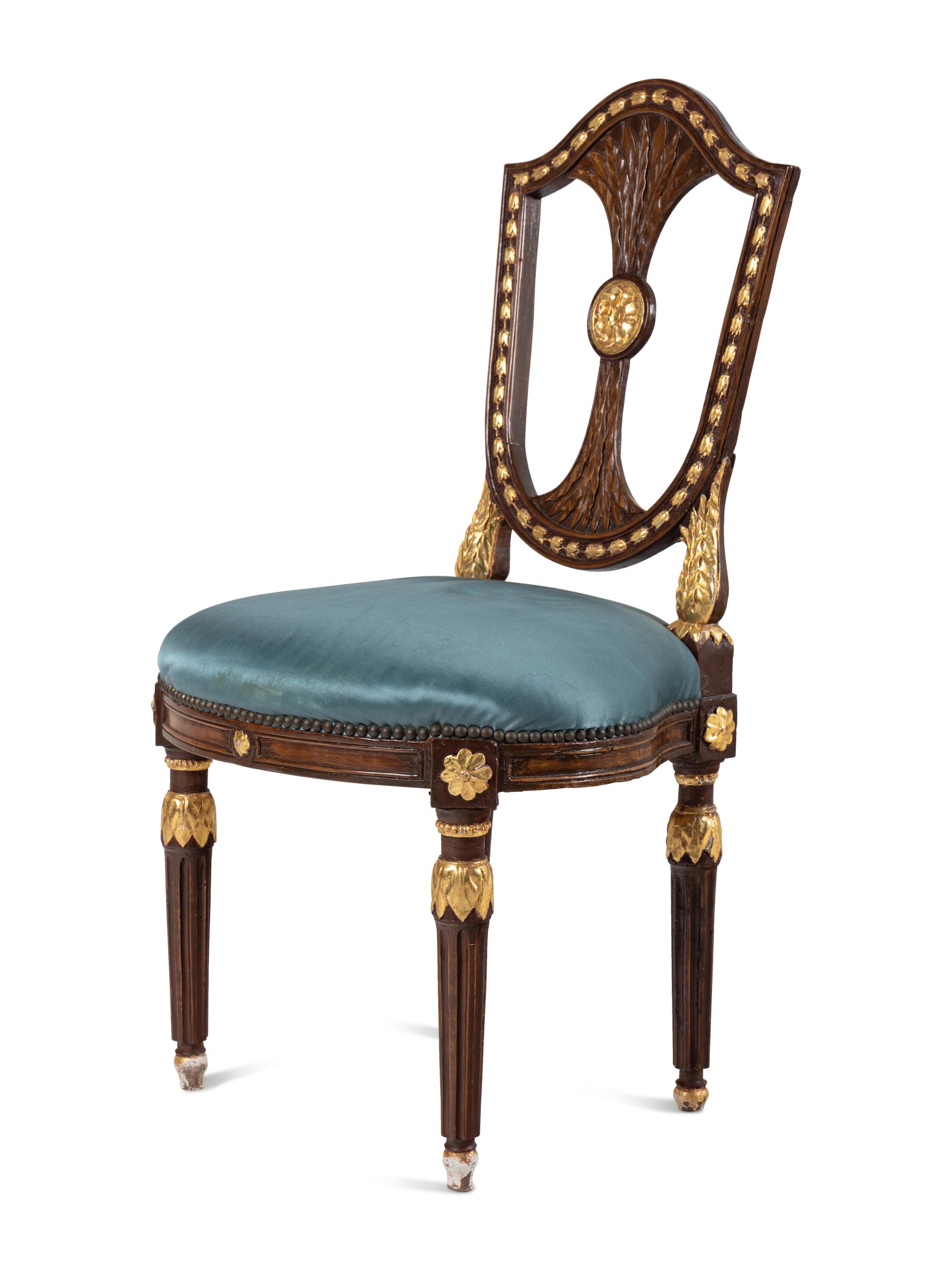 A Pair of Russian Neoclassical Parcel-Gilt Mahogany Side Chairs