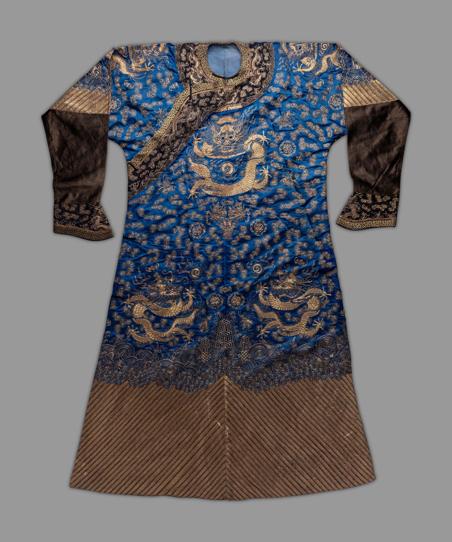 A Chinese Blue Ground Embroidered Silk Dragon Robe