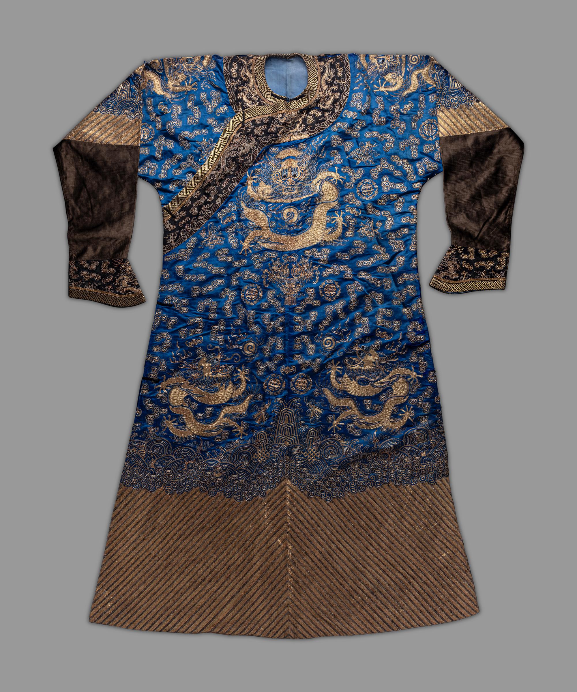 A Chinese Blue Ground Embroidered Silk Dragon Robe